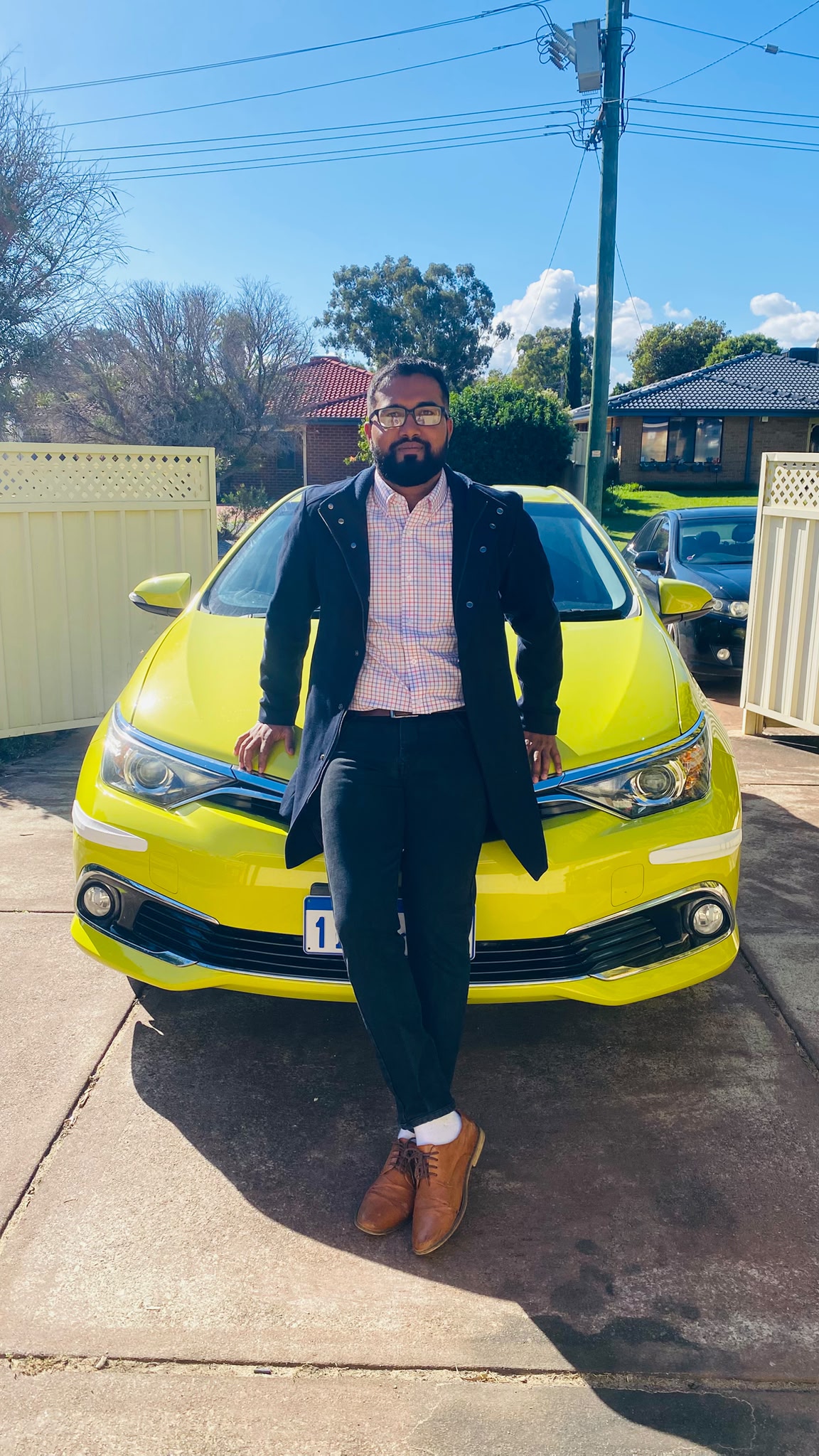Monna Ashraf – Munna Bhai Driving School instructor with teaching car